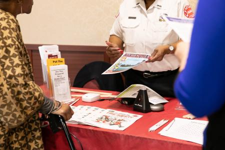 A group getting information at the Resource Fair.